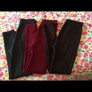 Three pair of gold medal fleece lined leggings